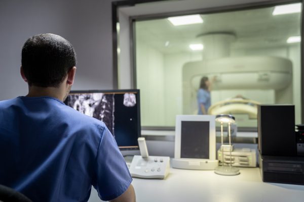Elderly Patient With Health Problems And Doctor In Medical Center